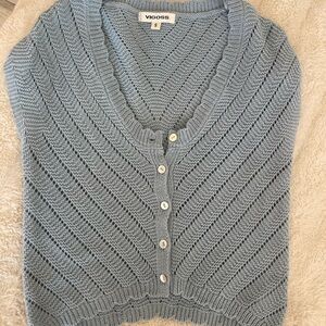 Vigoss crotchet button top
